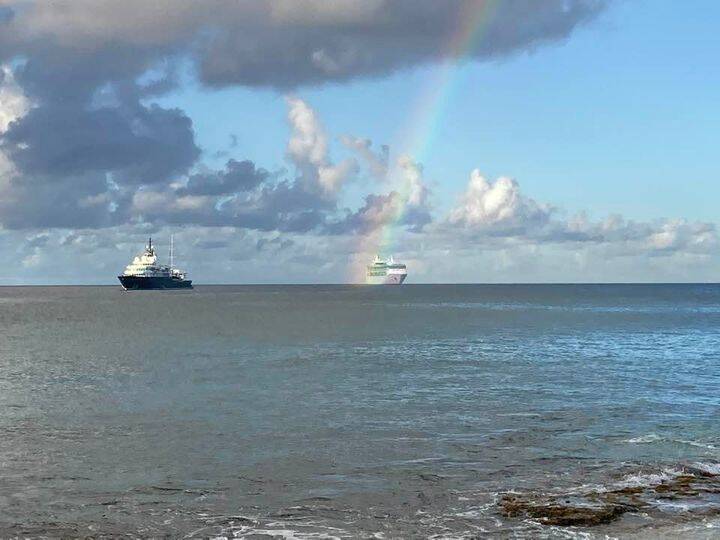 Attached picture Eclipse w rainbow.jpg